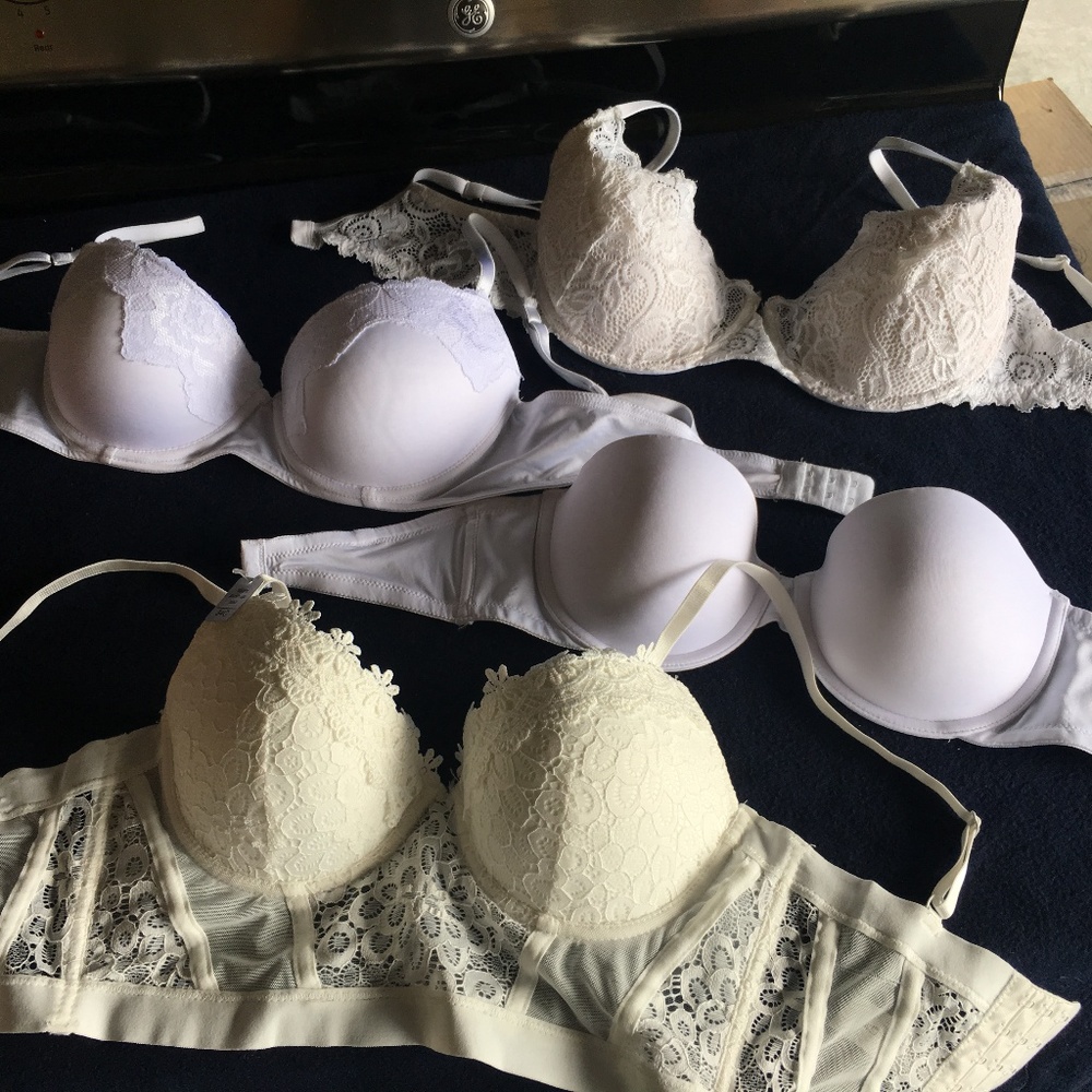 Beautiful 4 new or like new white bras 34C